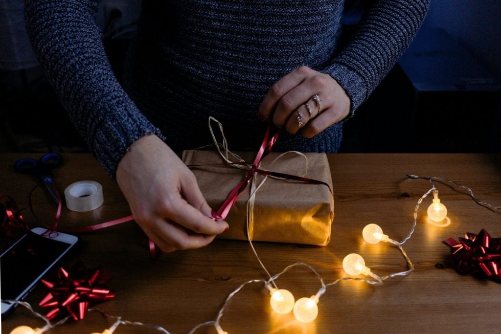 woman wrapping present